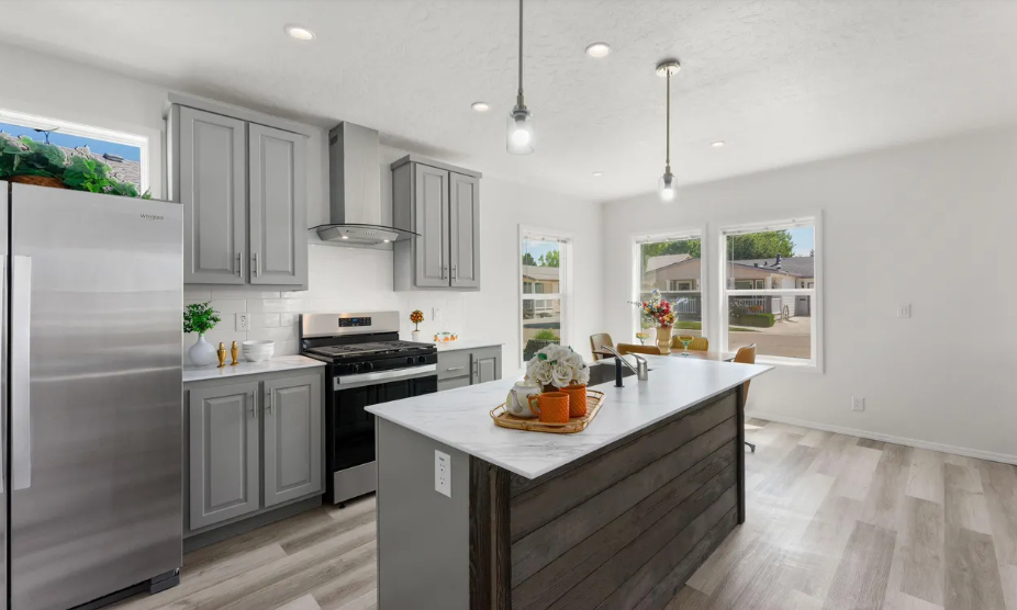 light filled kitchen with oversized island at brooke view in boise id