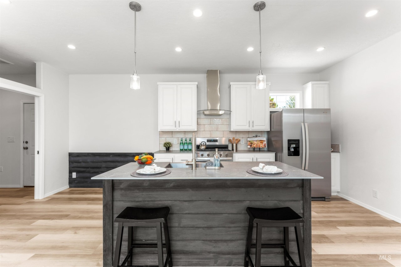 stylish kitchen with weathered wood island at brooke view in boise id